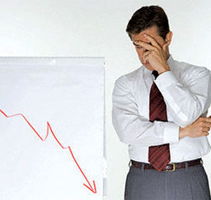 Businessman Peeking at Chart --- Image by © Royalty-Free/Corbis